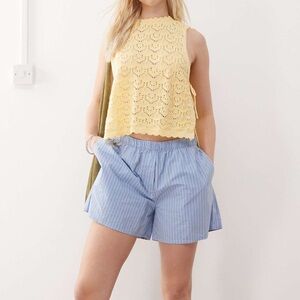 Yellow knit tie side sleeveless top